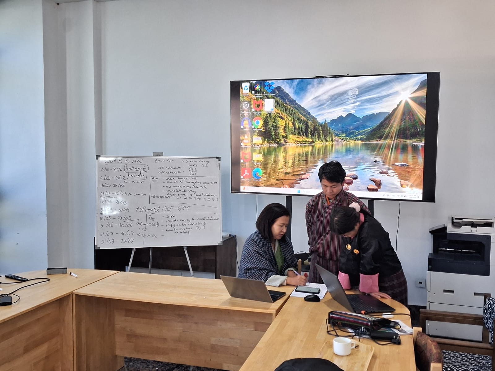 Tshering sharing her knowledge and skills with Sonam and Rinchen during Research Assistant training in Thimphu, January 2026.