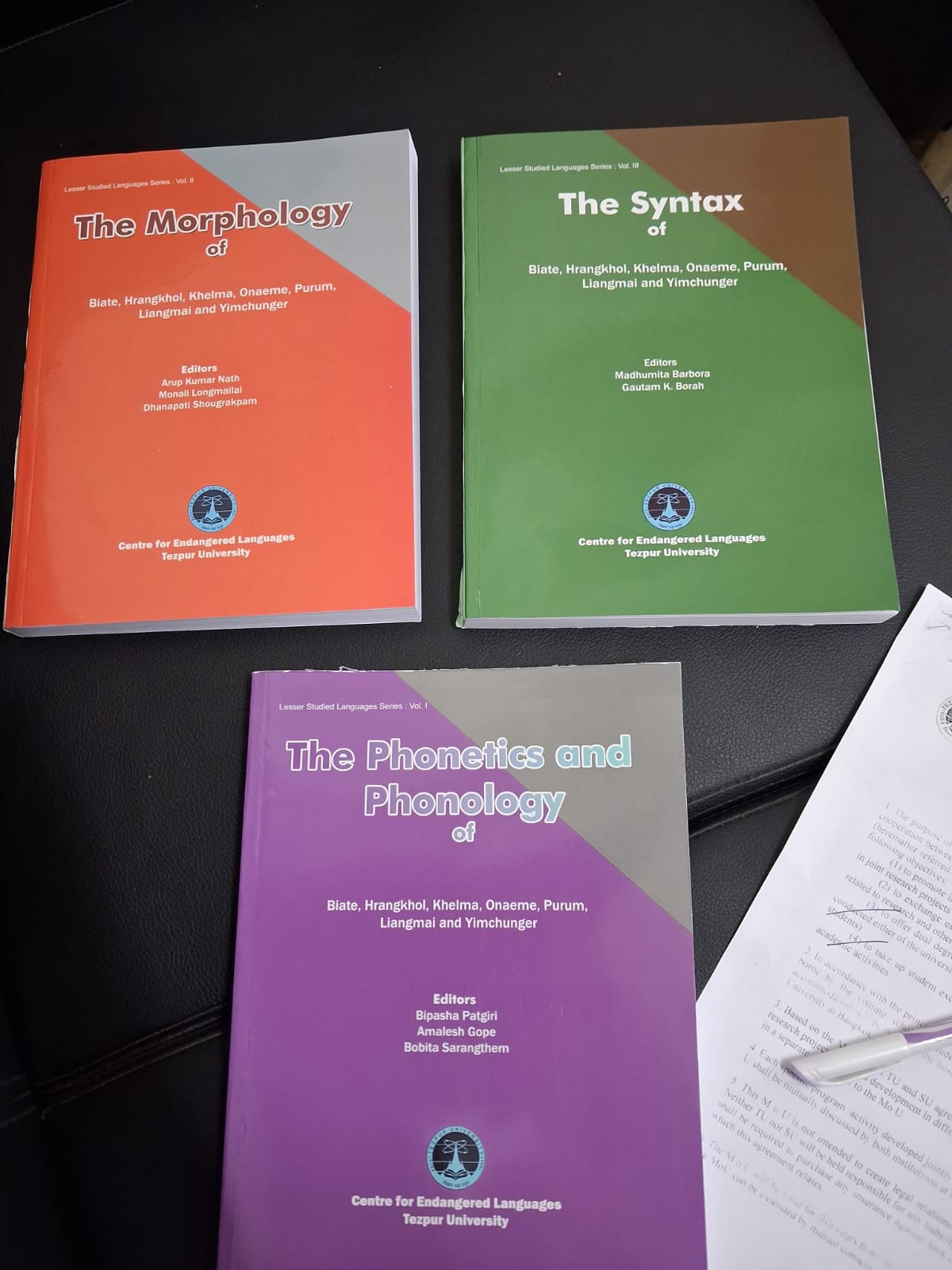 Publications on endangered languages of Northeast India by Tezpur University presented to Tim.