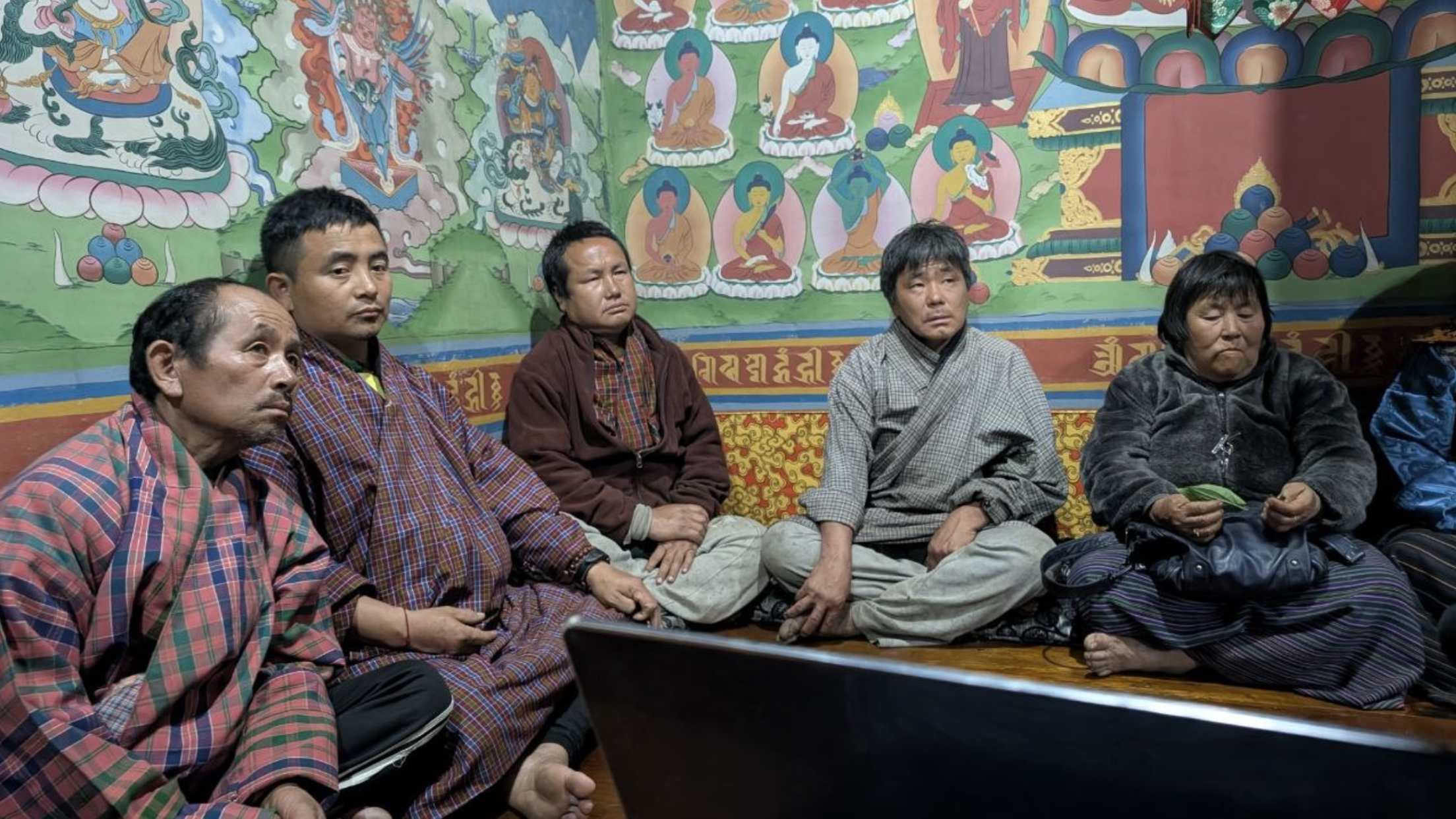 Community members attending a meeting in Chungseng village